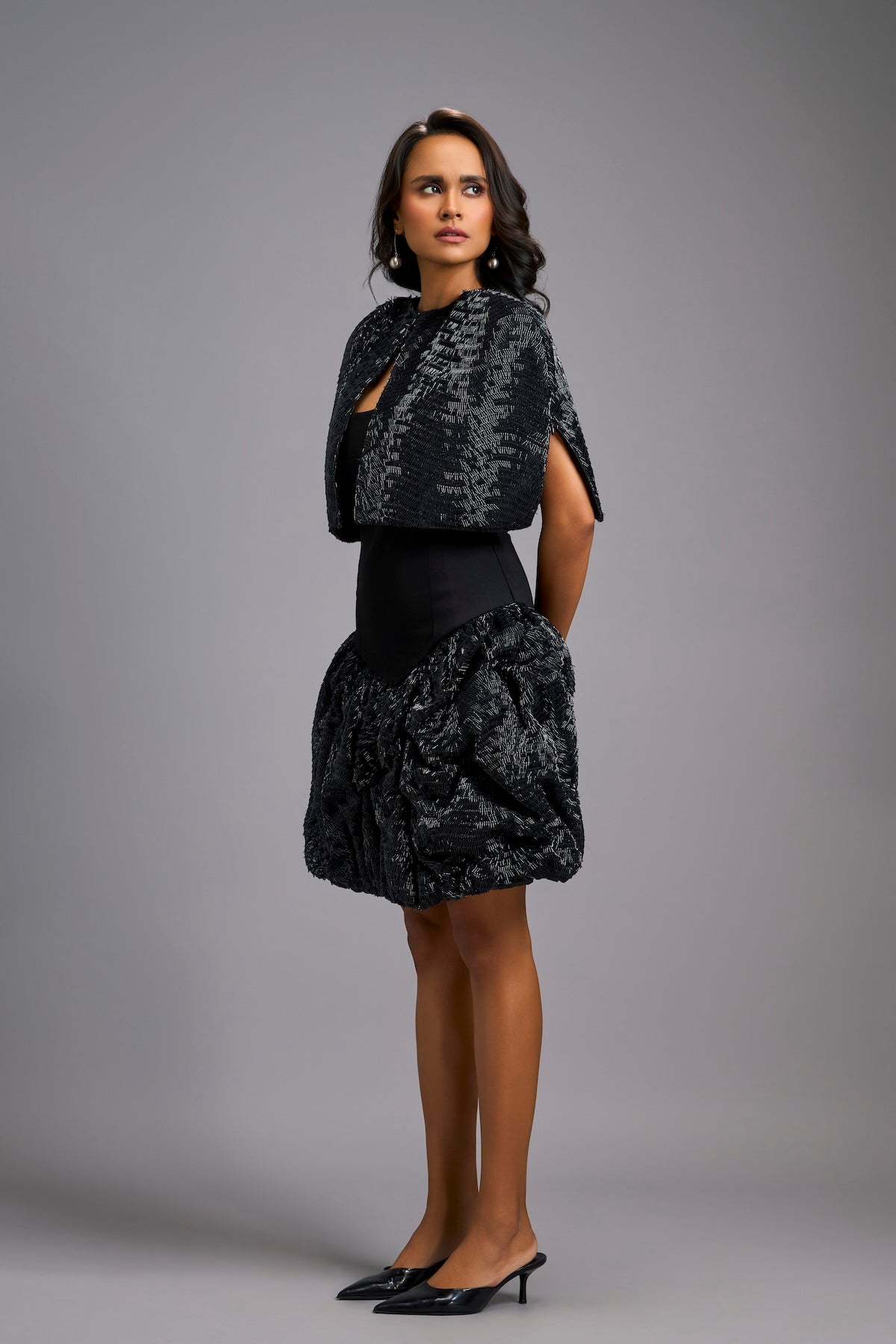 Strapless Black Dress with Voluminous Shimmer Skirt & Cape