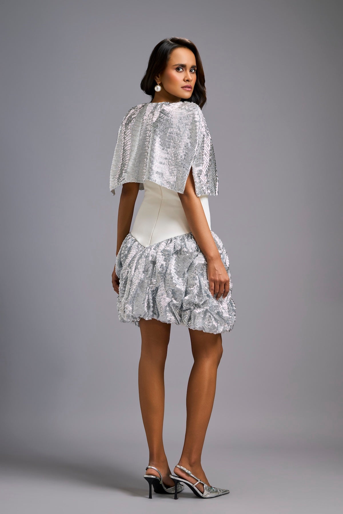 Strapless White Dress with Voluminous Shimmer Skirt & Cape