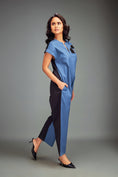Load image into Gallery viewer, Two-Tone Jumpsuit with Front Zipper & Metallic Embellishments
