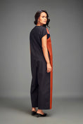 Load image into Gallery viewer, Two-Tone Jumpsuit with Front Zipper & Metallic Embellishments
