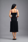 Load image into Gallery viewer, BLACK ASYMMETRIC MIDI DRESS WITH CONTRAST PINK BUSTIER AND RUFFLE HEM
