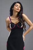 Load image into Gallery viewer, BLACK ASYMMETRIC MIDI DRESS WITH CONTRAST PINK BUSTIER AND RUFFLE HEM
