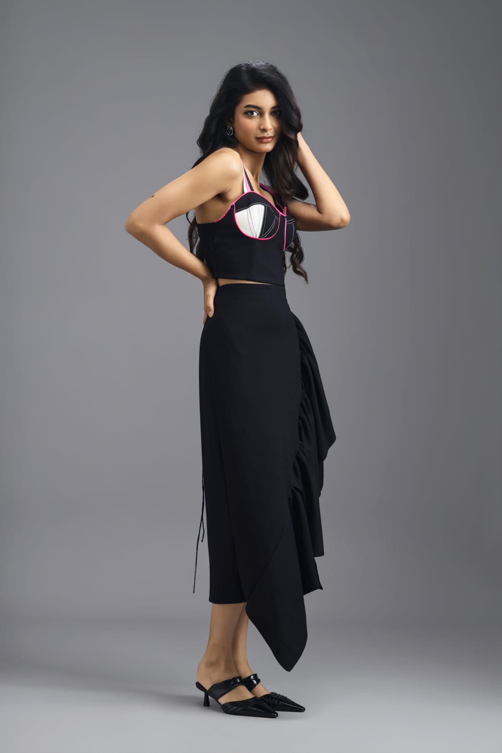 BLACK CO-ORD SET WITH NEON PIPED CORSET TOP AND ASYMMETRIC RUFFLE SKIRT