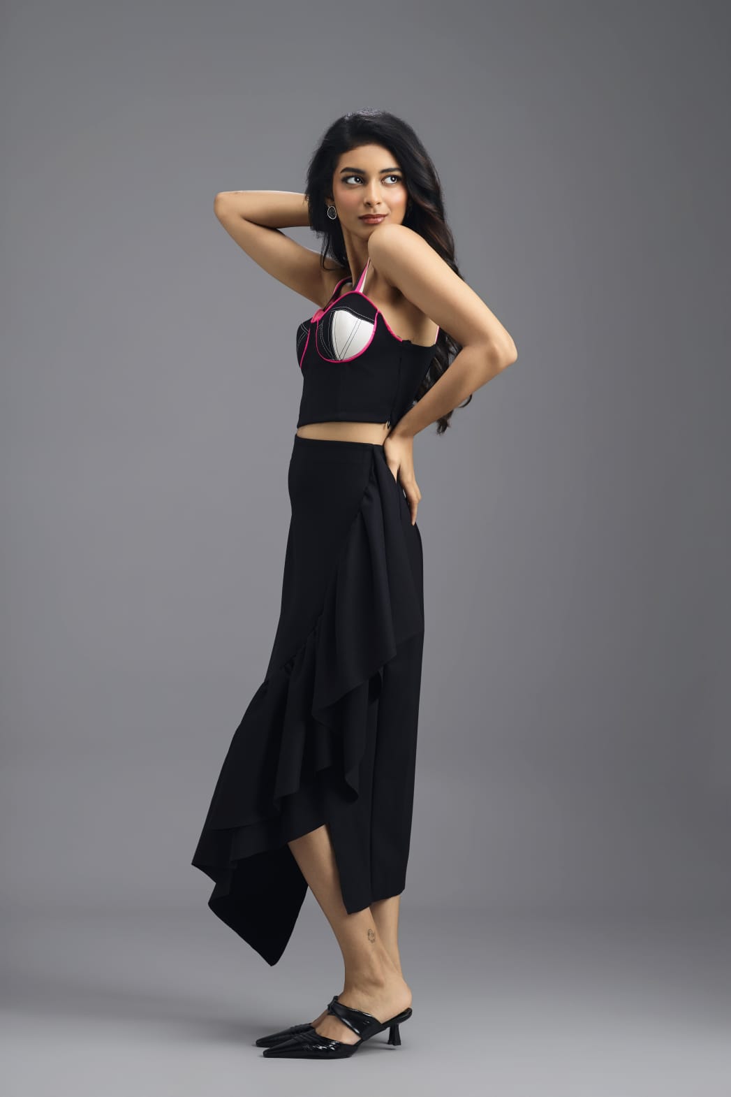 BLACK CO-ORD SET WITH NEON PIPED CORSET TOP AND ASYMMETRIC RUFFLE SKIRT