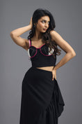 Load image into Gallery viewer, BLACK CO-ORD SET WITH NEON PIPED CORSET TOP AND ASYMMETRIC RUFFLE SKIRT
