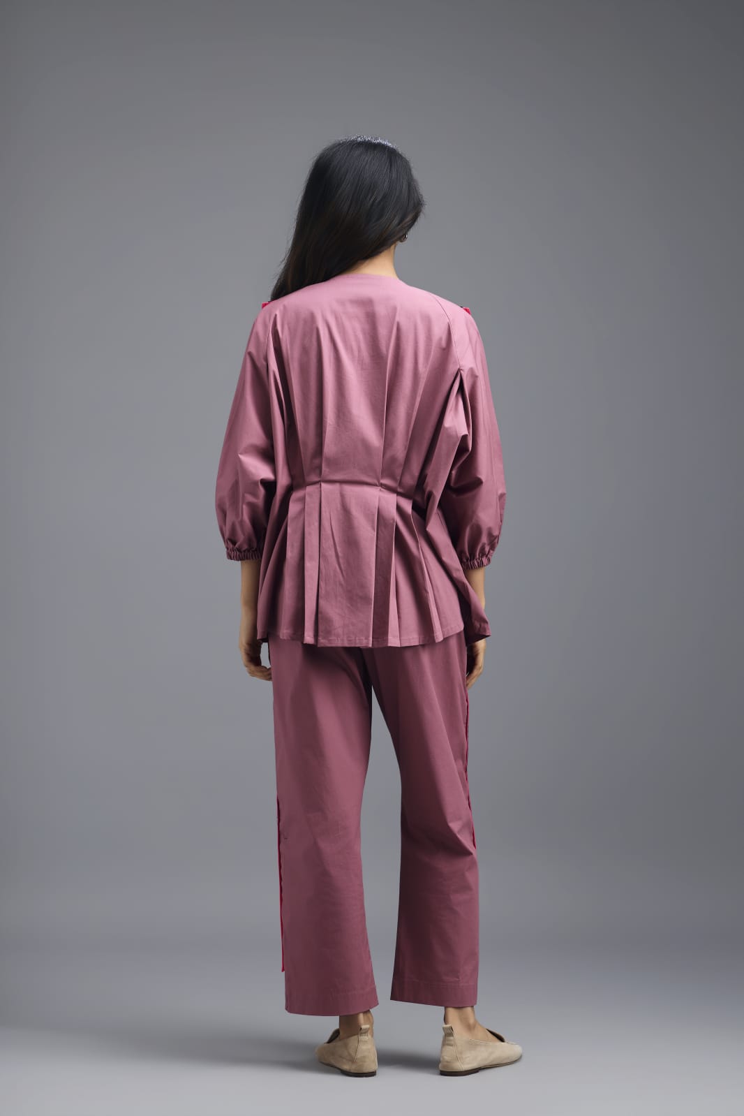 PINK TAILORED PANTS WITH NEON GEOMETRIC POCKET PANEL DETAIL