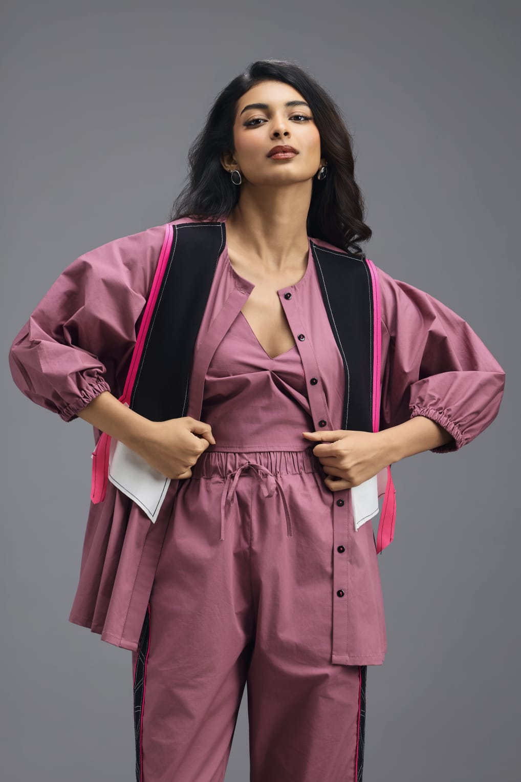 PINK CO-ORD SET WITH NEON GEOMETRIC PANEL DETAIL, BRALETTE AND ELASTICATED PANTS