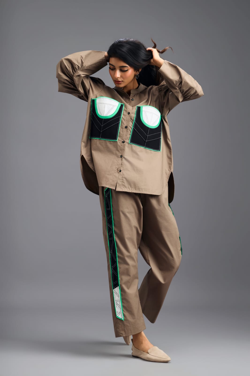 MUD TAILORED PANTS WITH NEON GEOMETRIC POCKET PANEL DETAIL