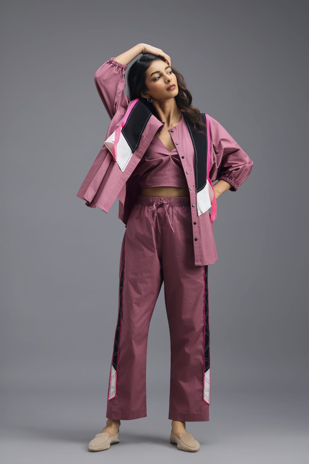 PINK TAILORED PANTS WITH NEON GEOMETRIC SIDE PANEL DETAIL