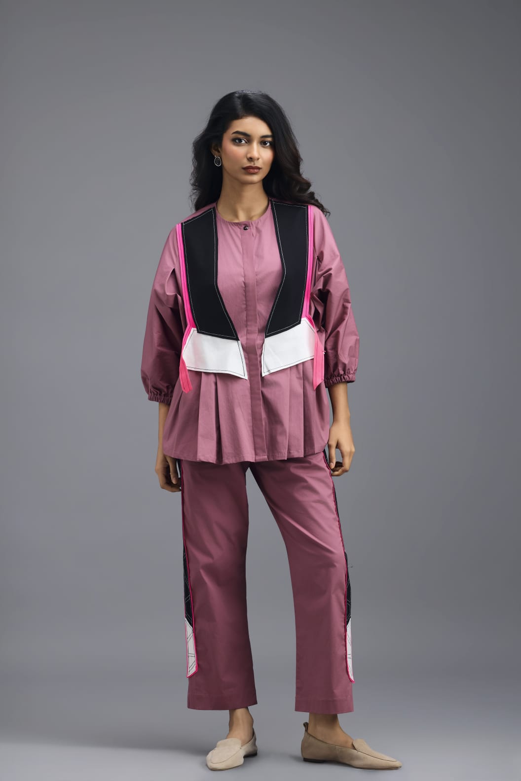 PINK TAILORED PANTS WITH NEON GEOMETRIC SIDE PANEL DETAIL