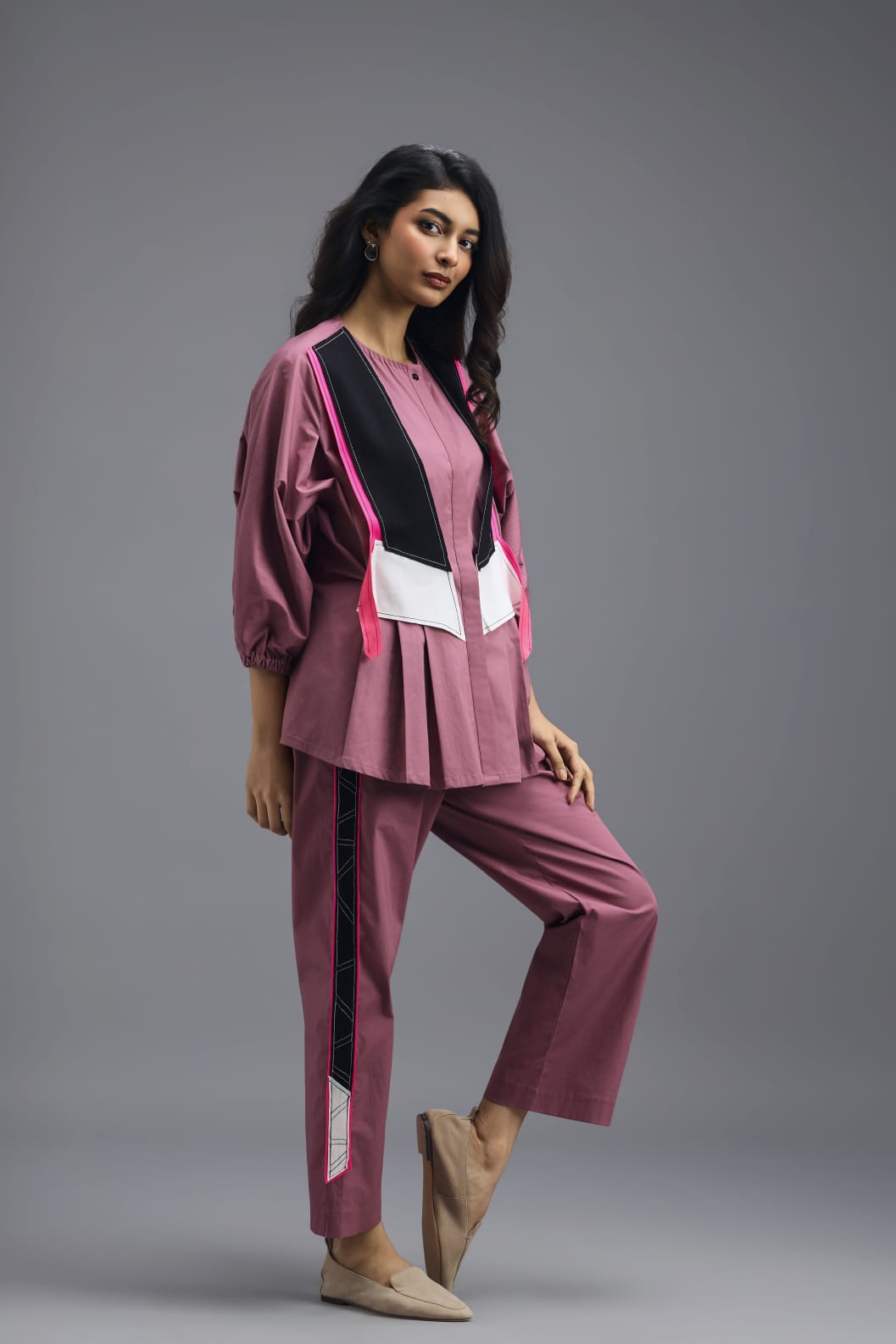PINK TAILORED PANTS WITH NEON GEOMETRIC SIDE PANEL DETAIL