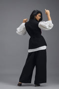Load image into Gallery viewer, BLACK CO-ORD SET WITH NEON PANELLED VEST, PUFF-SLEEVE SHIRT AND TROUSERS
