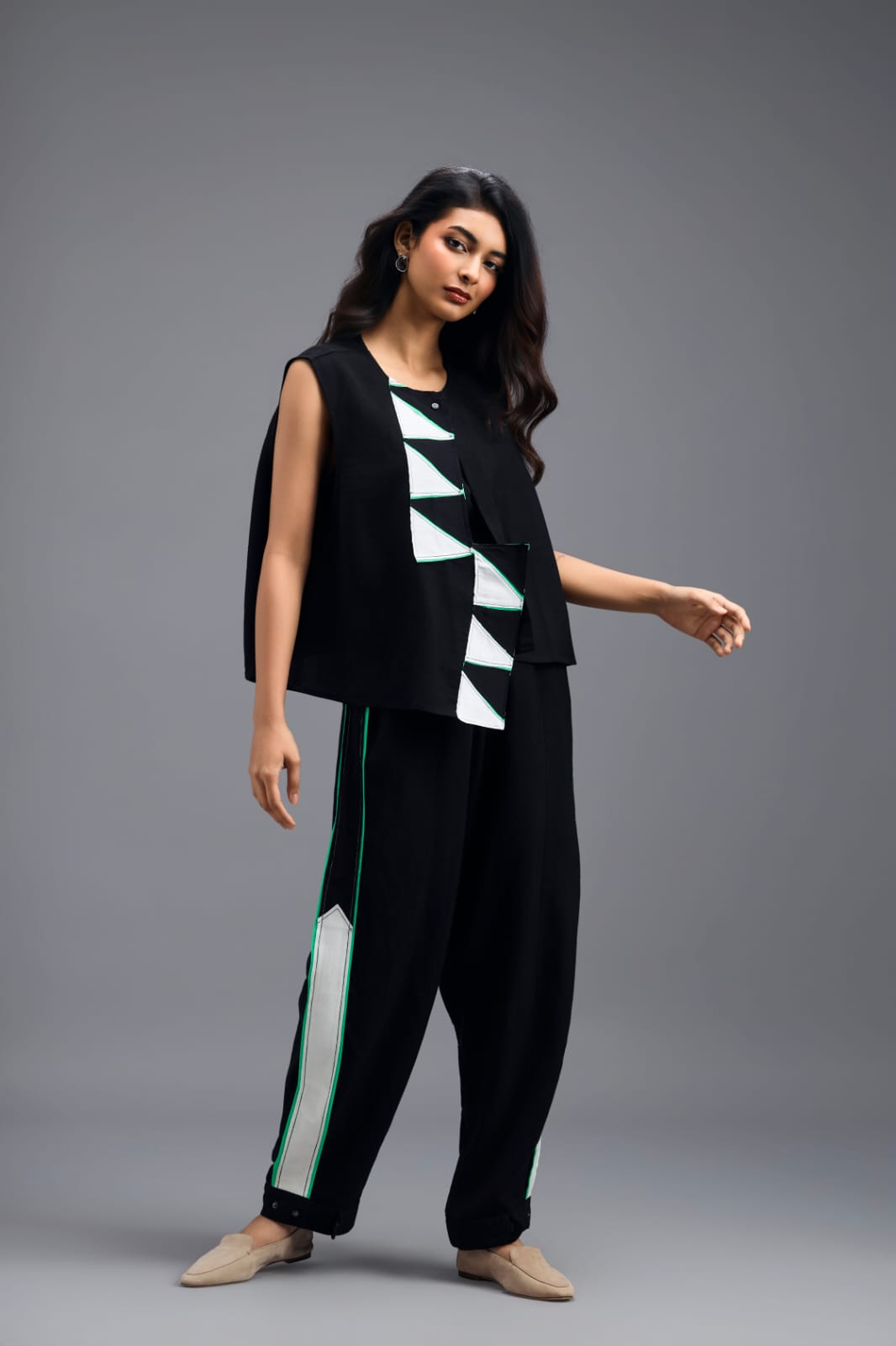 BLACK JACKET WITH NEON PIPED GEOMETRIC DETAIL
