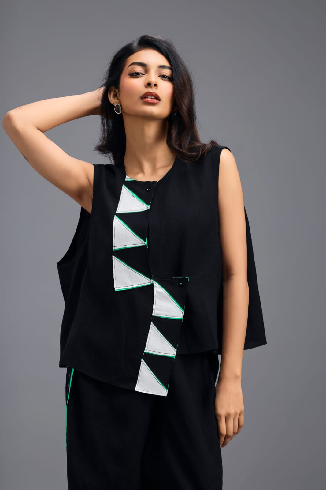 BLACK JACKET WITH NEON PIPED GEOMETRIC DETAIL