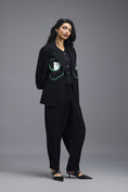 Load image into Gallery viewer, BLACK CO-ORD SET WITH GEOMETRIC PATCH DETAIL BLAZER, PEPLUM INNER AND RELAXED TROUSERS
