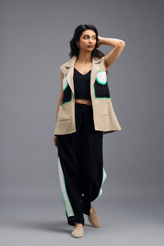 BEIGE CO-ORD SET WITH NEON GEOMETRIC PANELLED SLEEVELESS BLAZER, TWISTED TOP AND STRIPE PANTS