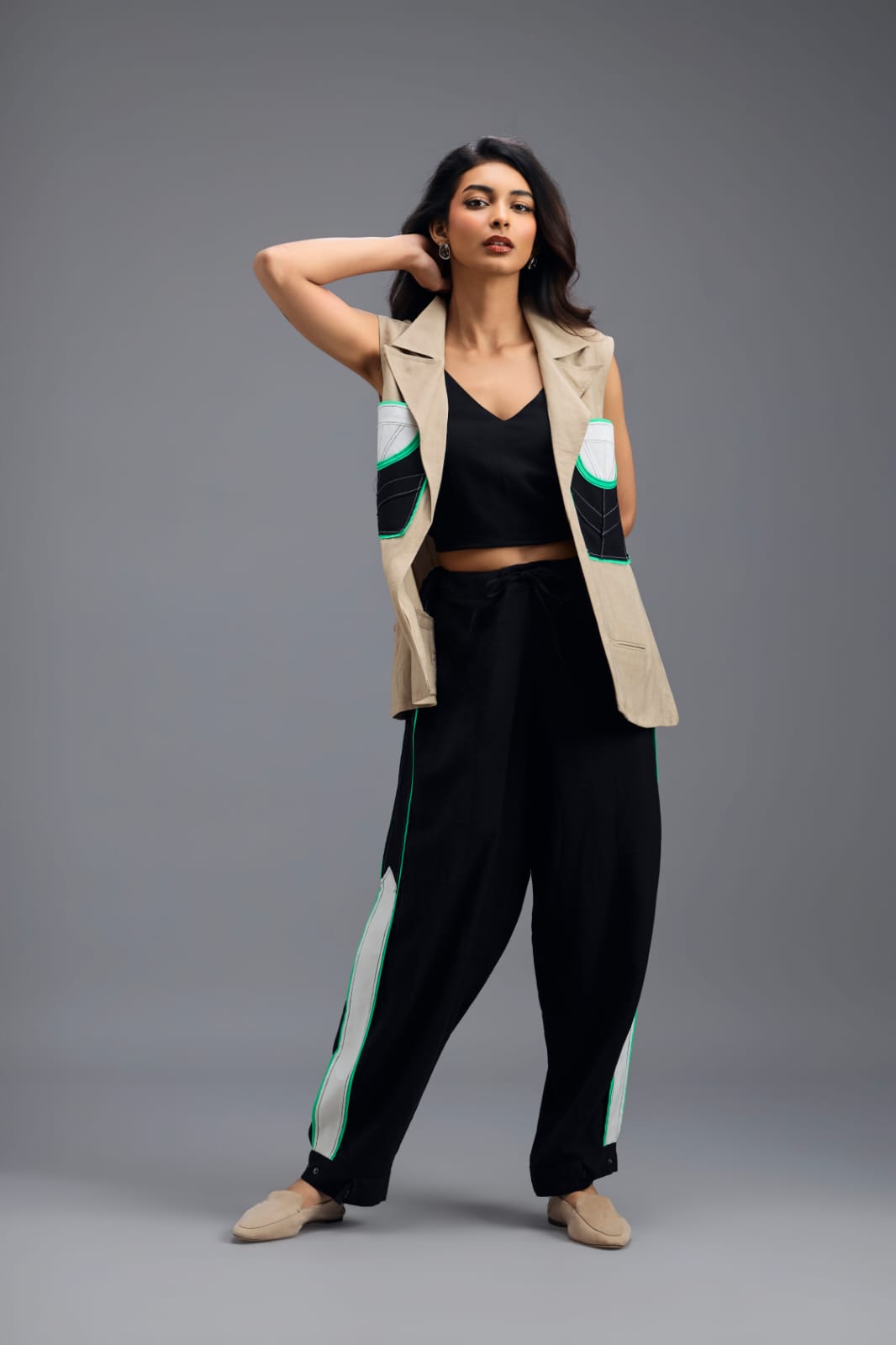 BEIGE CO-ORD SET WITH NEON GEOMETRIC PANELLED SLEEVELESS BLAZER, TWISTED TOP AND STRIPE PANTS