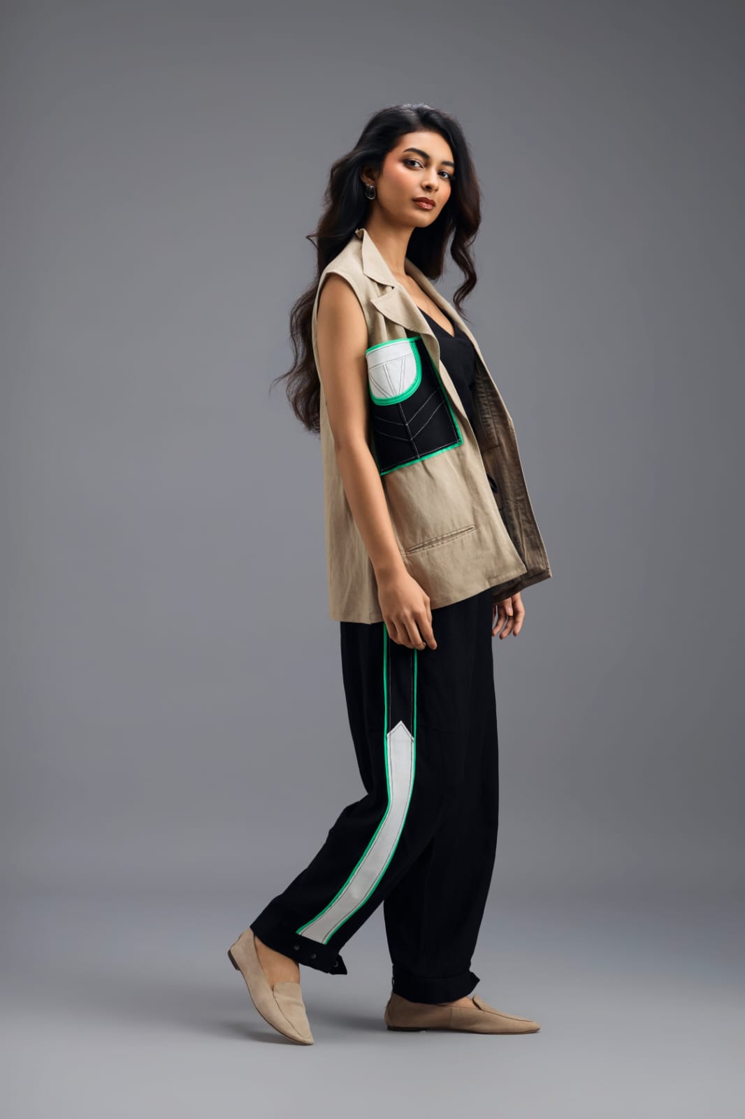 BEIGE CO-ORD SET WITH NEON GEOMETRIC PANELLED SLEEVELESS BLAZER, TWISTED TOP AND STRIPE PANTS