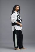Load image into Gallery viewer, BLACK CO-ORD SET WITH PANELLED VEST, PUFF-SLEEVE SHIRT AND CONTRAST STRIPE TROUSERS
