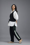 Load image into Gallery viewer, BLACK CO-ORD SET WITH PANELLED VEST, PUFF-SLEEVE SHIRT AND CONTRAST STRIPE TROUSERS
