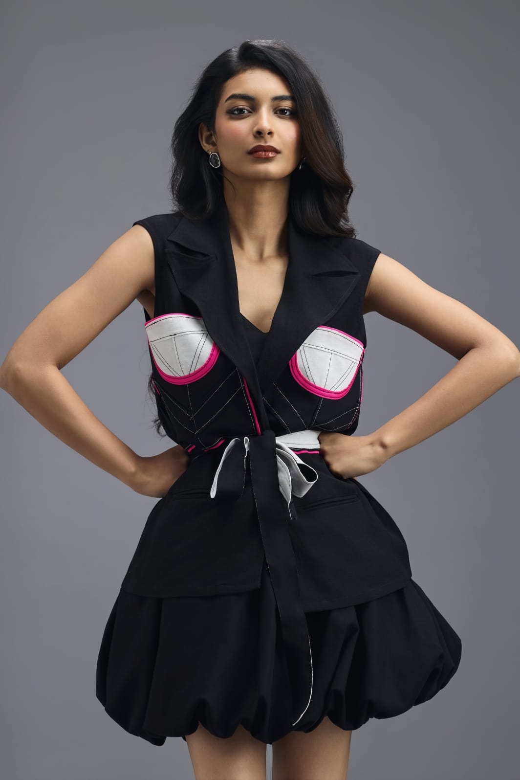 BLACK CO-ORD SET WITH NEON GEOMETRIC PANELLED SLEEVELESS BLAZER AND BUBBLE SKIRT