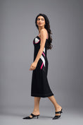 Load image into Gallery viewer, BLACK ASYMMETRIC MIDI DRESS WITH CONTRAST PINK BUSTIER AND RUFFLE HEM
