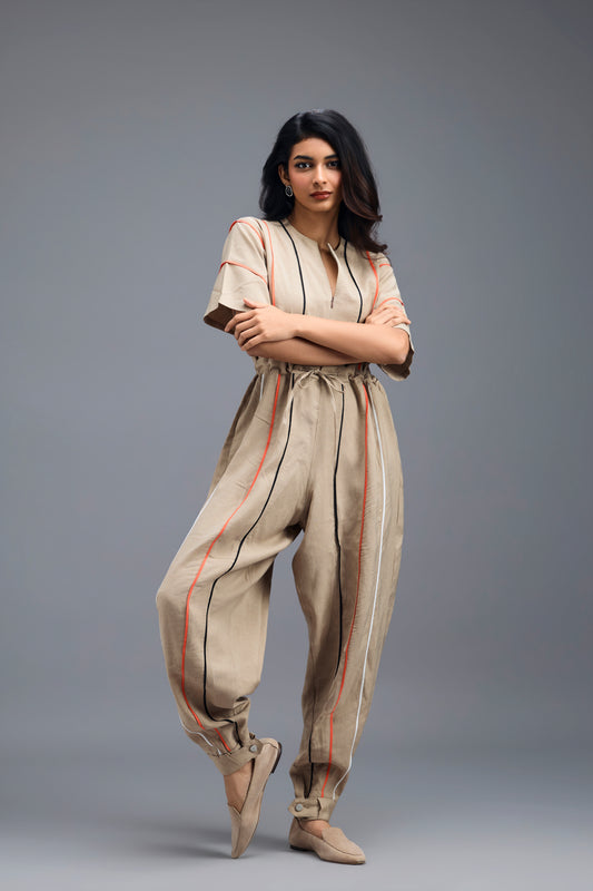 BEIGE ZIP-FRONT JUMPSUIT WITH NEON CONTRAST PIPING
