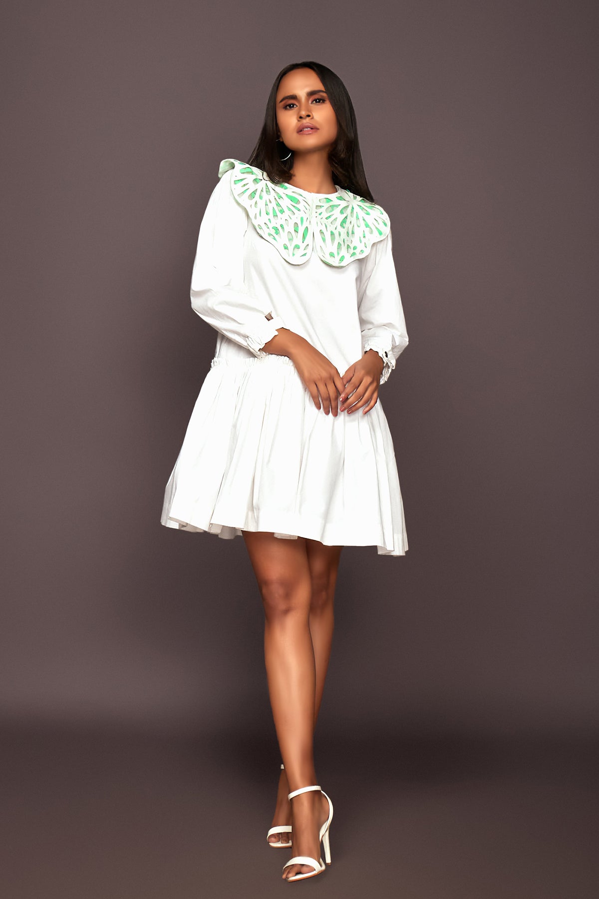 White Dress With Puff Sleeves And Frill Bottom